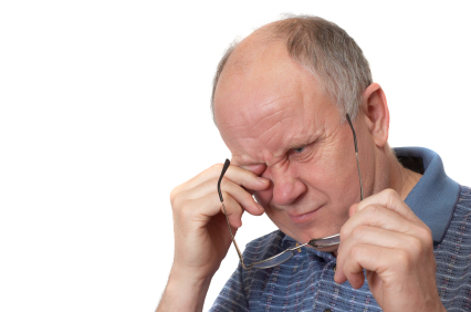 Bored senior man. Emotional portraits series. Isolated on white. Blended vision lets you say good bye to reading glasses